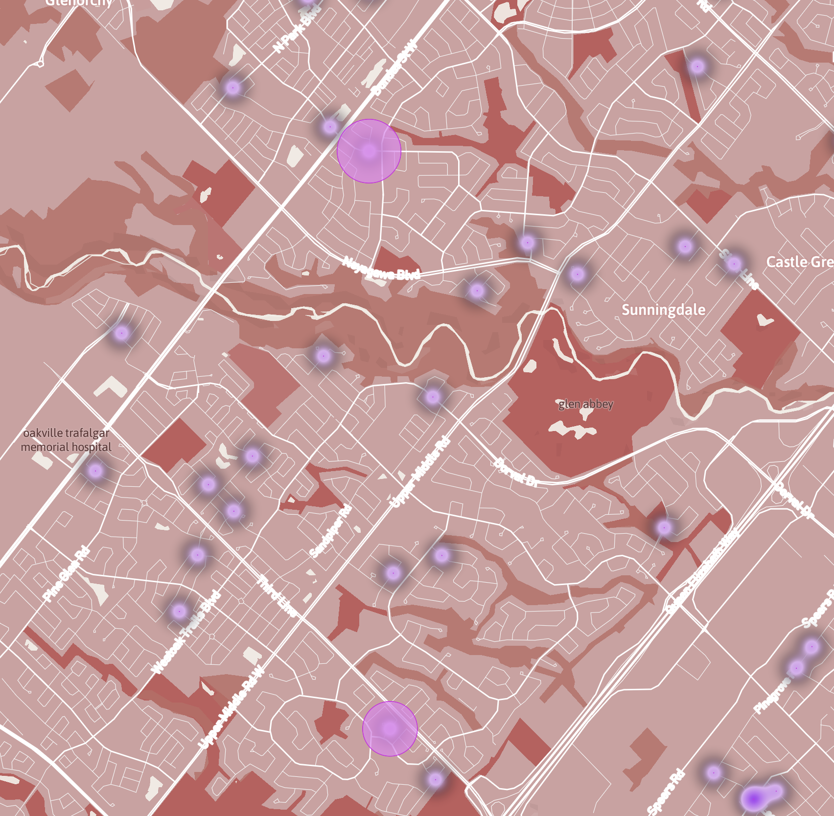 A screenshot of exploring in Mapbox with a heat map representing house break ins in Oakville in the last 8 months in combination with data driven circles.